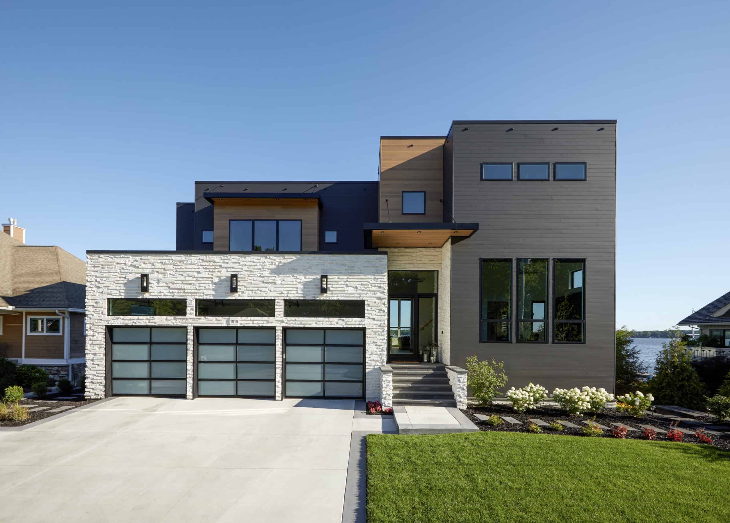 Modern home exterior with Vesta steel plank siding.